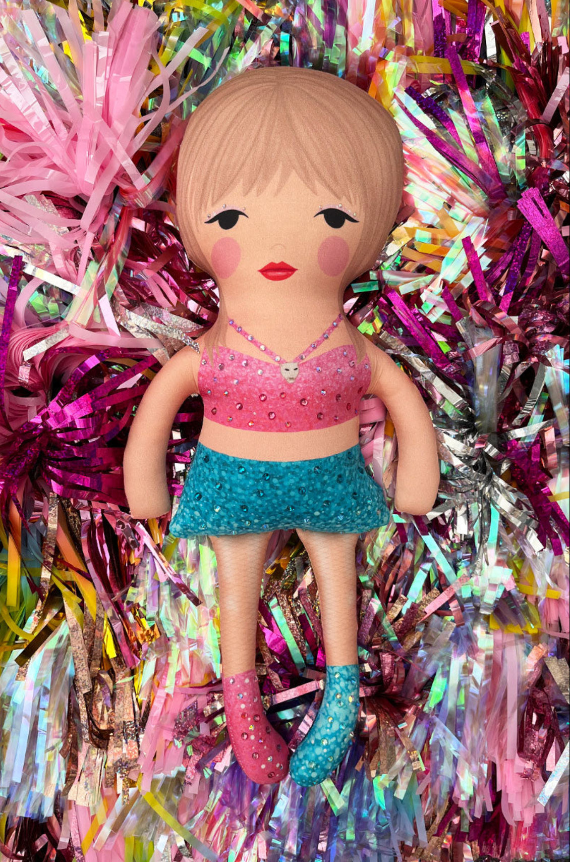 the unstuffed 1989 doll in pink and blue