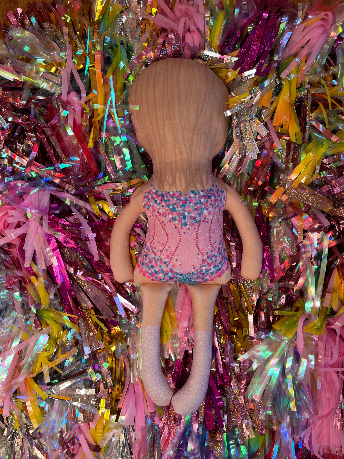 the unstuffed lover doll in pink and blue