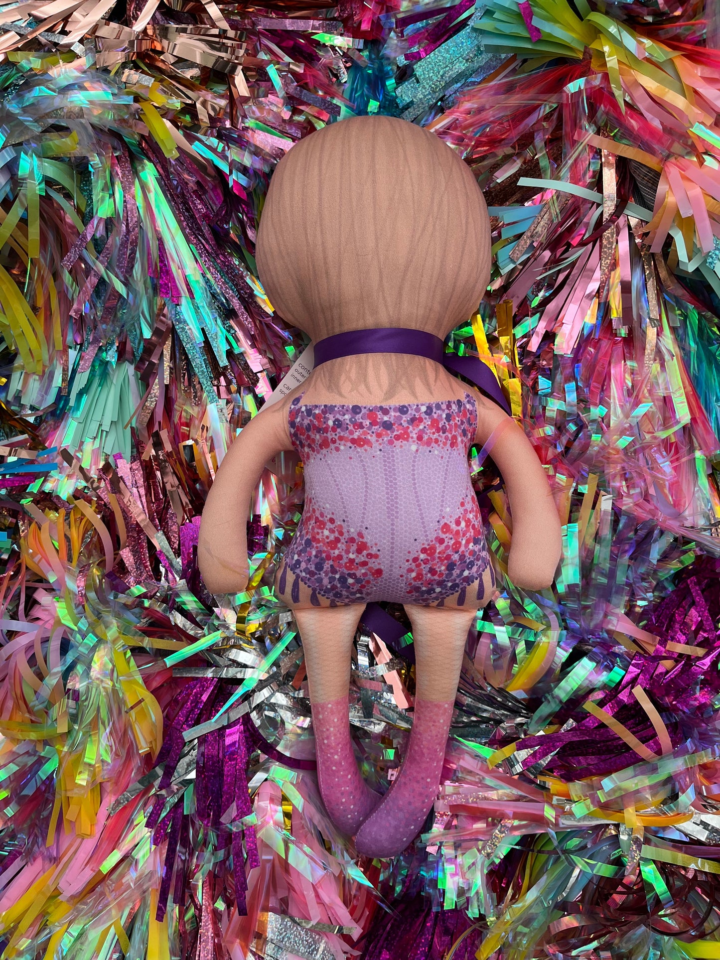 the unstuffed lover doll in purple