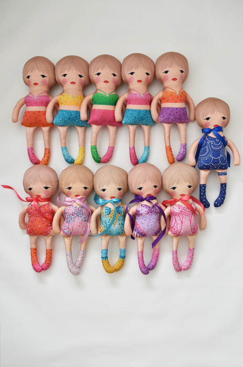 the 1989 doll in yellow and blue