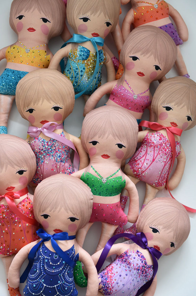 the 1989 doll in yellow and blue