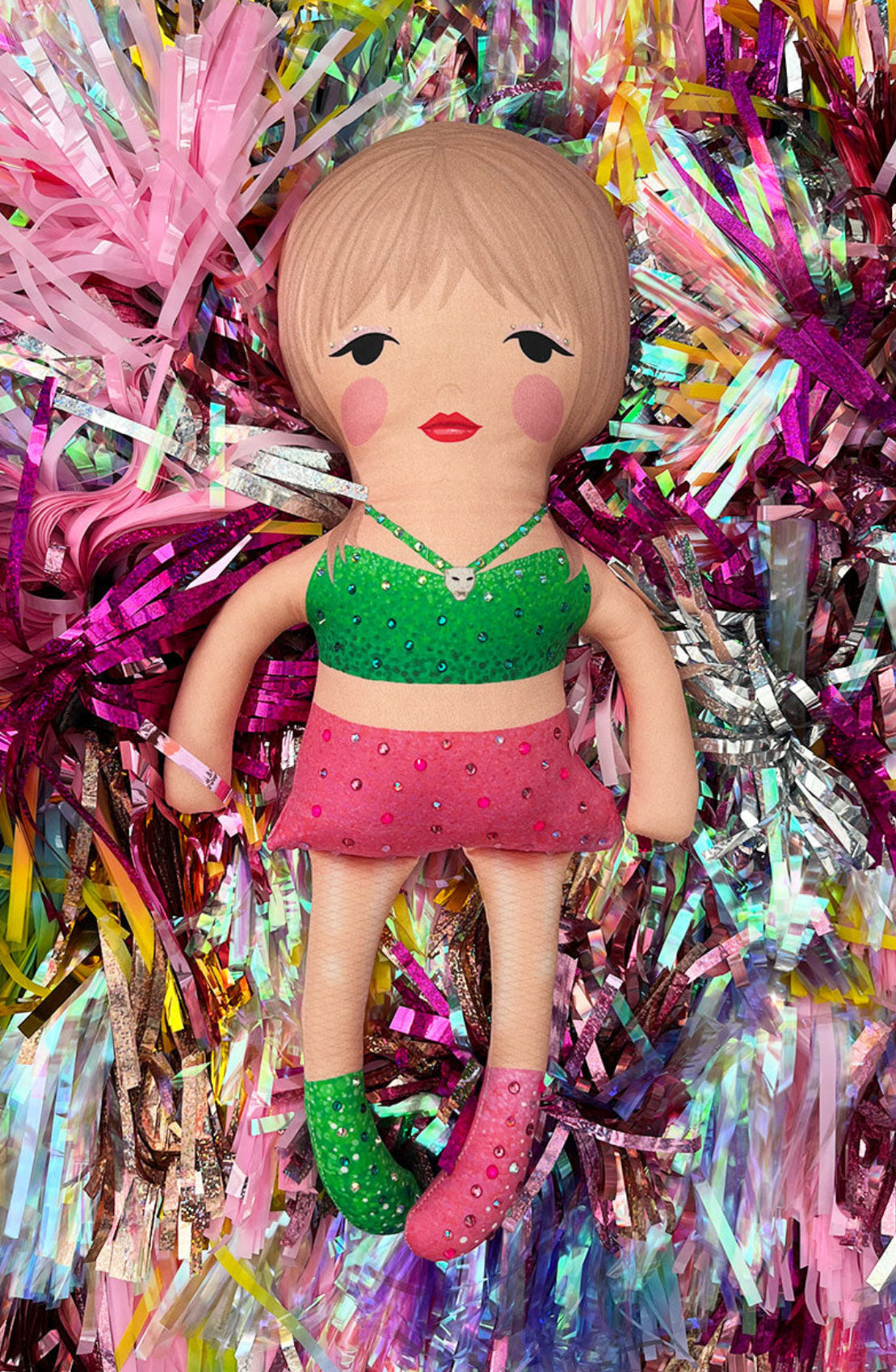 the unstuffed 1989 doll in pink and green