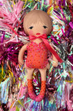 the lover doll in orange and hot pink