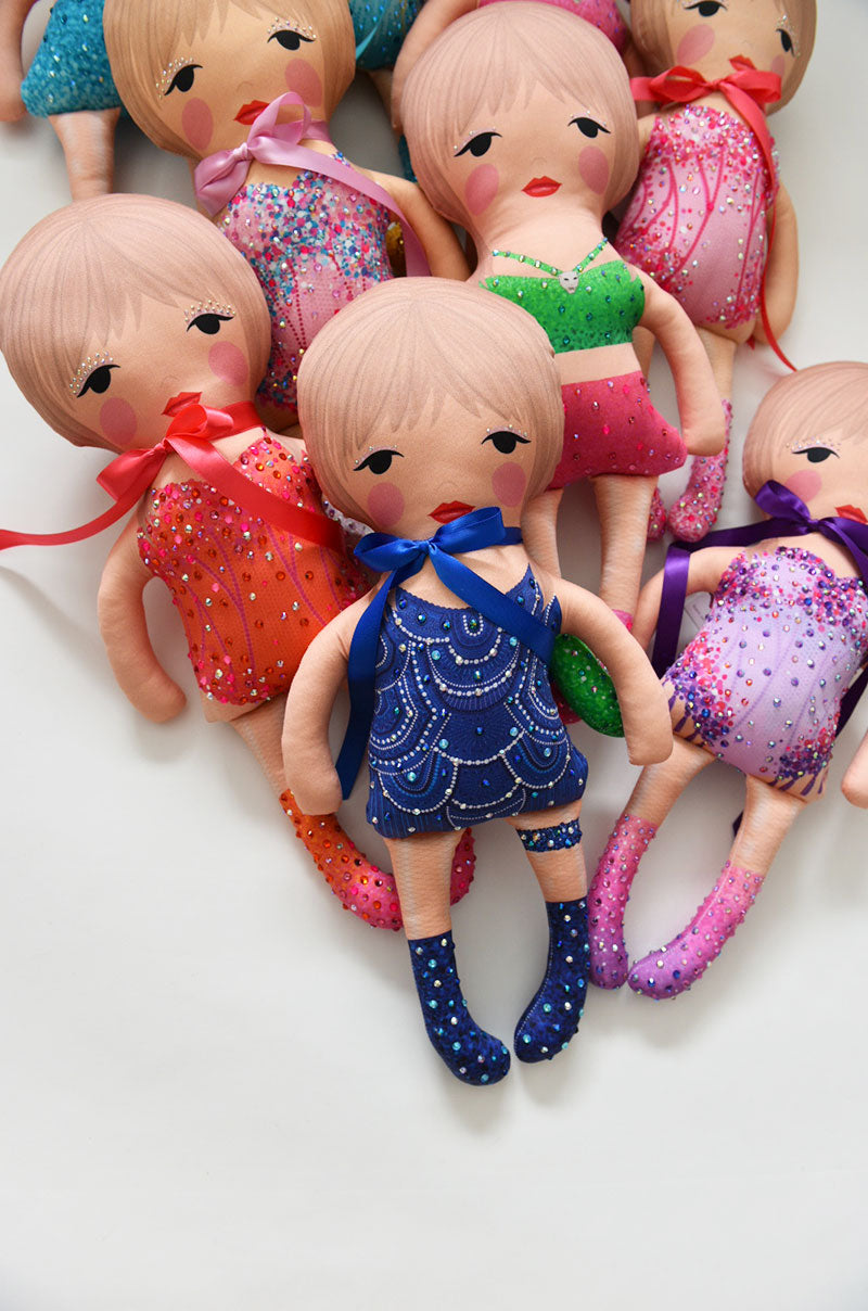 the 1989 doll in yellow and blue