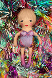 the unstuffed lover doll in purple